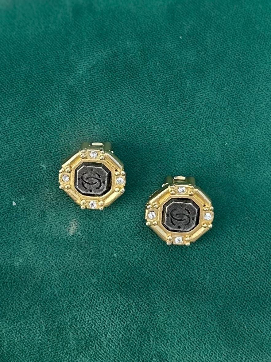 Vintage 1980s Signed ROXANNE ASSOULIN Gold Tone Octagonal Rhinestone Faux CC Engraved Stone Clip-on Earrings Rare