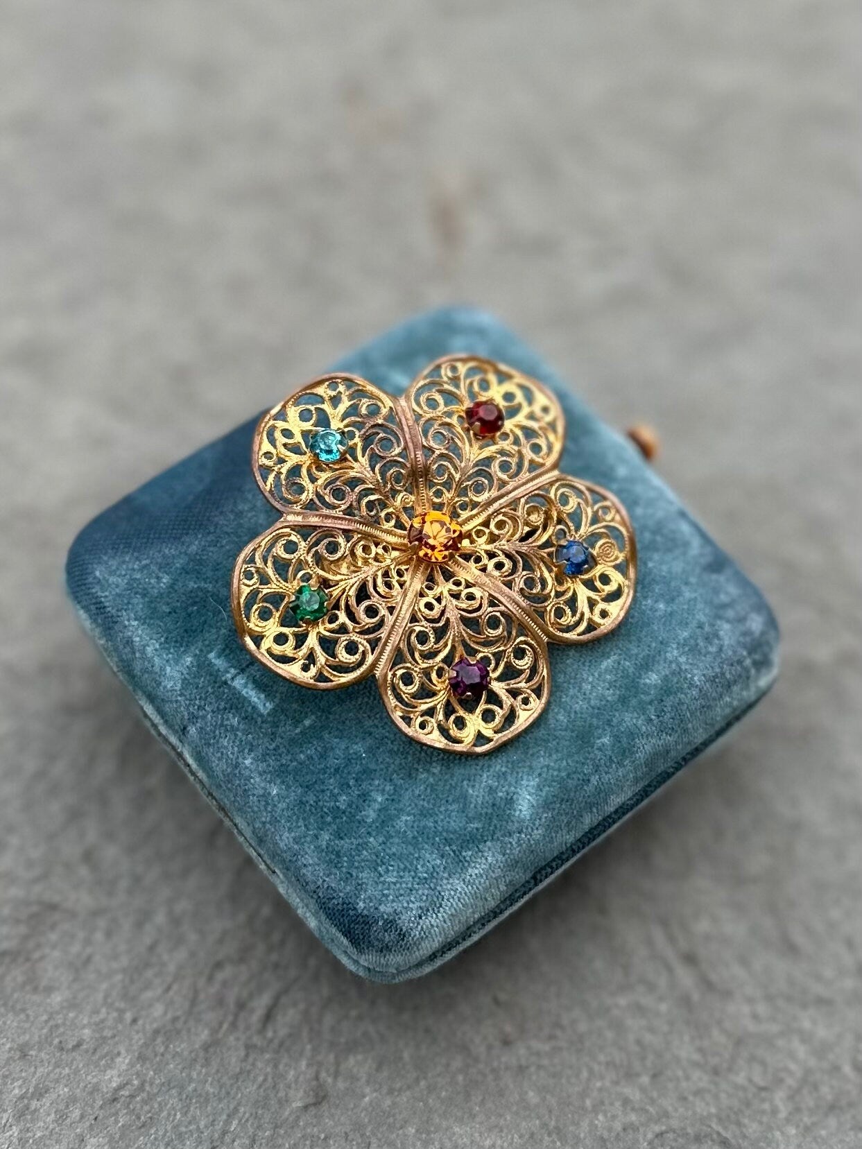 Vintage Midcentury Multicolor Rhinestone Gold Tone Filigree Openwork Flower Floral Brooch Pin