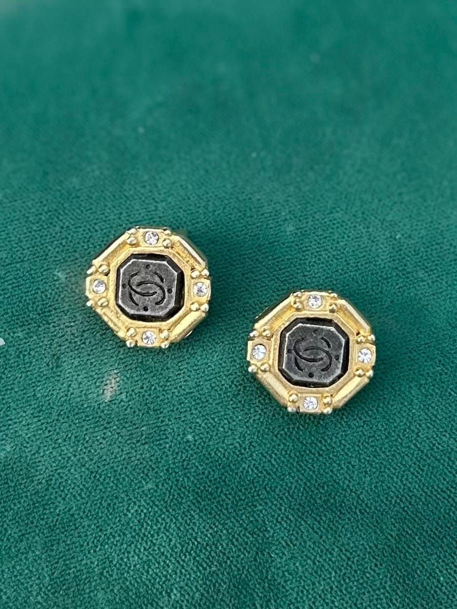 Vintage 1980s Signed ROXANNE ASSOULIN Gold Tone Octagonal Rhinestone Faux CC Engraved Stone Clip-on Earrings Rare