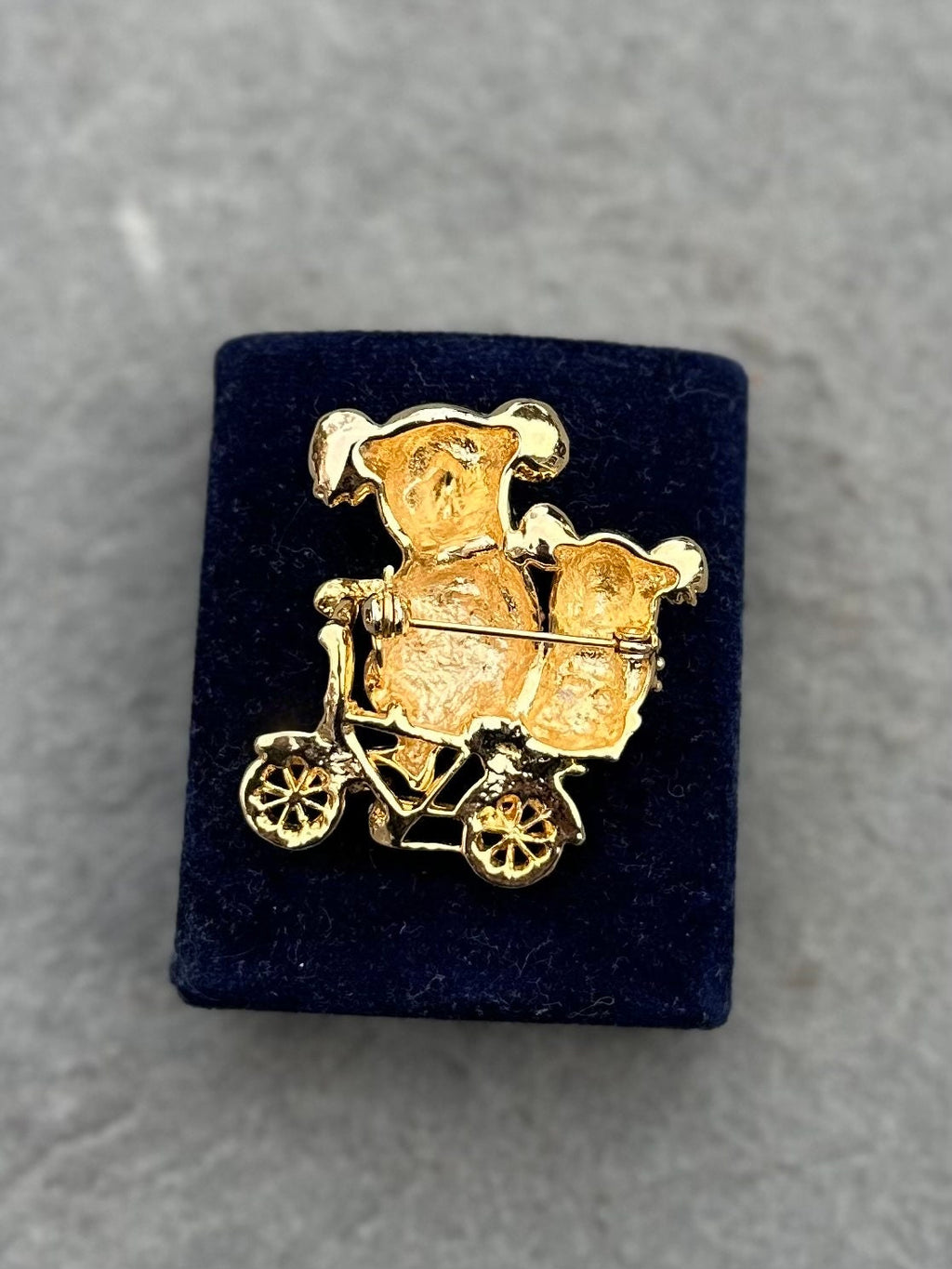 Vintage Gold Tone Koala Bear and Cub with Red Rhinestone Eyes Riding a Bike Brooch Pin