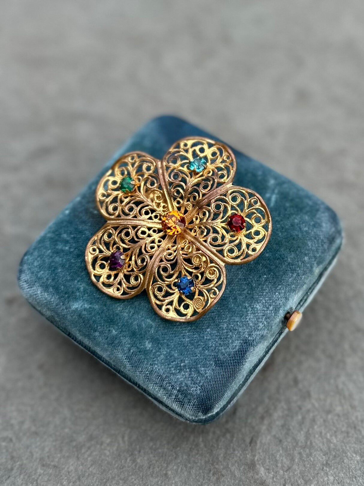Vintage Midcentury Multicolor Rhinestone Gold Tone Filigree Openwork Flower Floral Brooch Pin