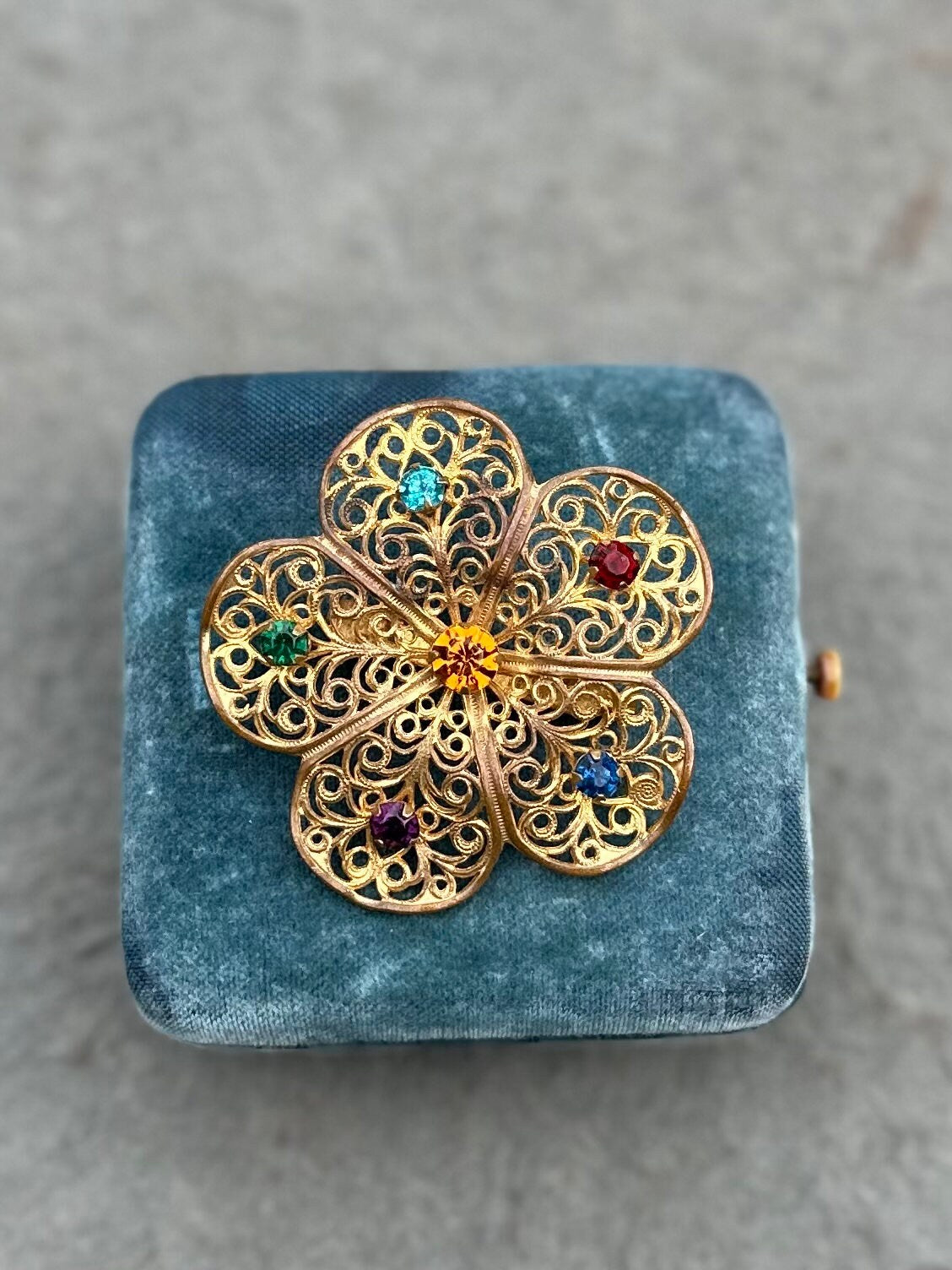 Vintage Midcentury Multicolor Rhinestone Gold Tone Filigree Openwork Flower Floral Brooch Pin