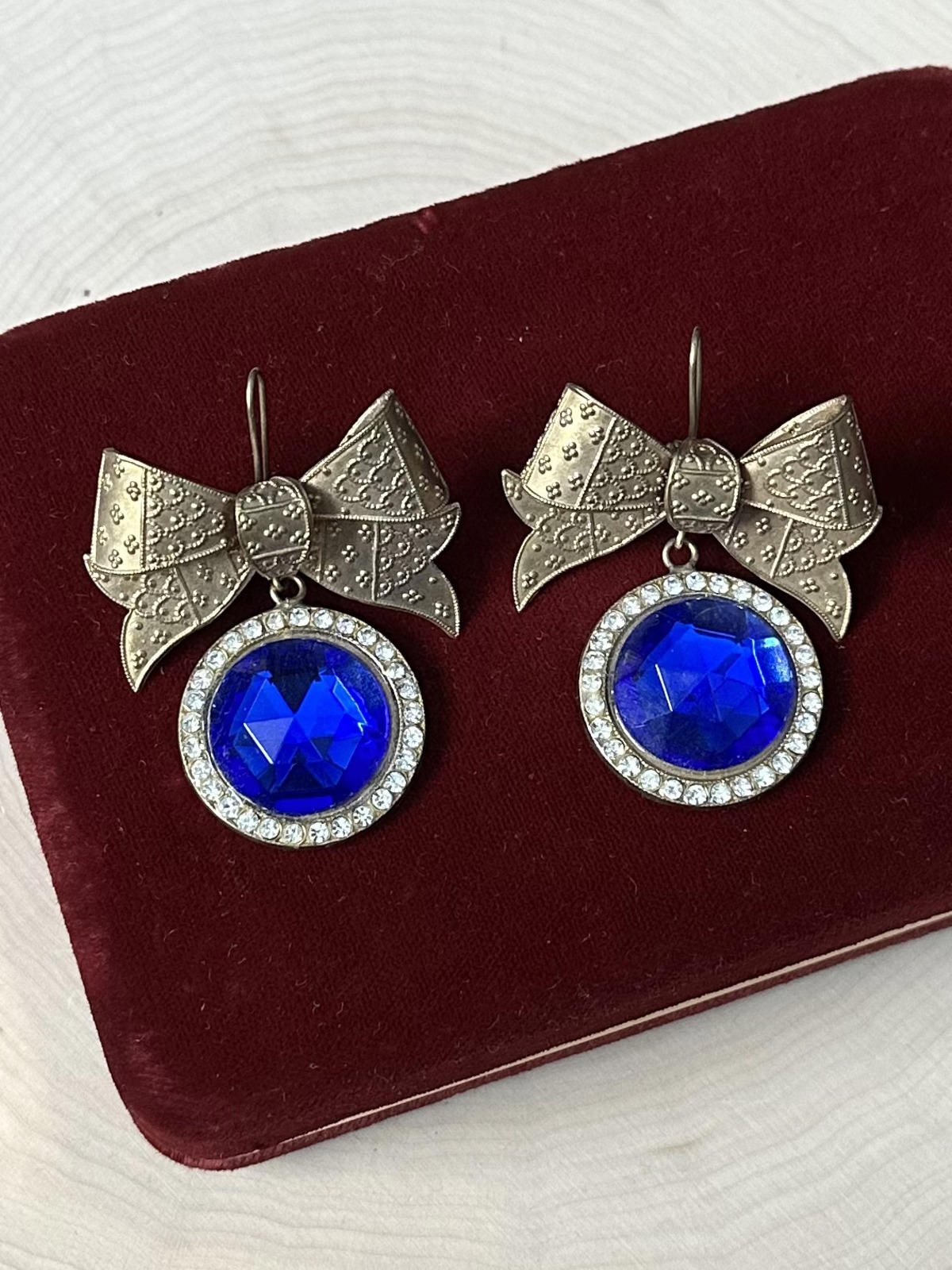 1980s Signed TONIC Gold Tone Bow Blue Rhinestone Statement Earrings