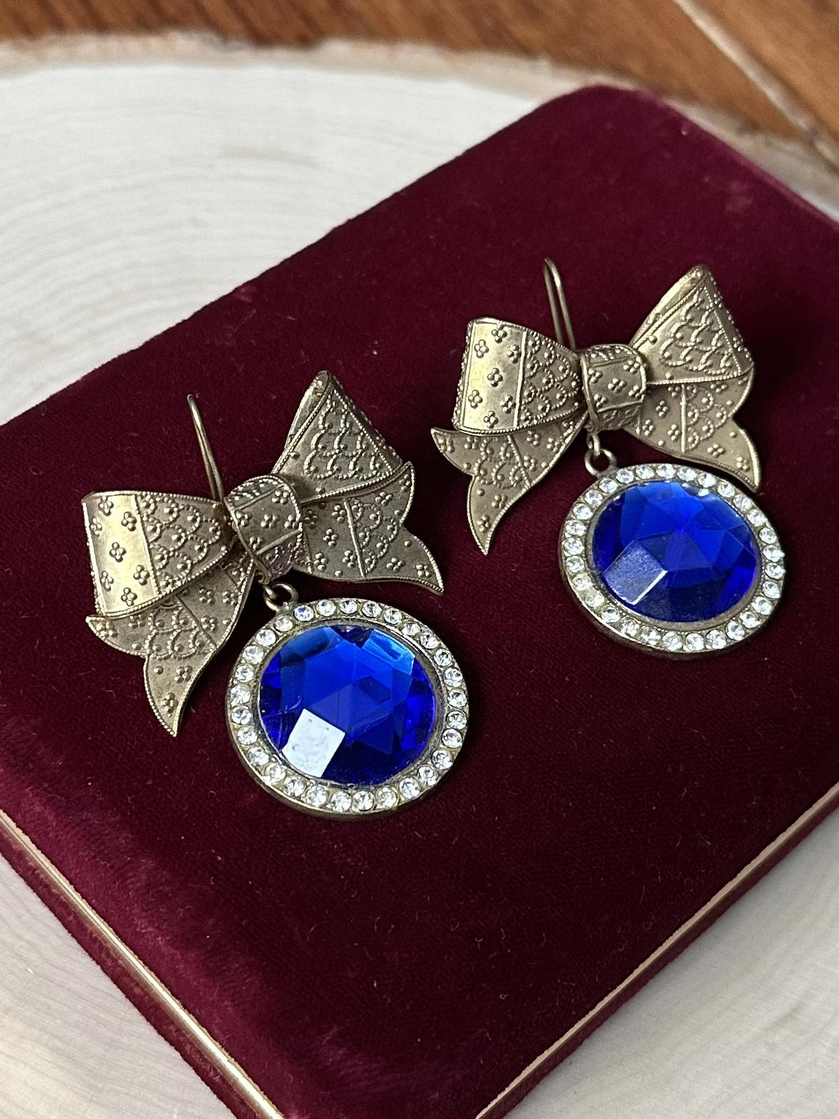1980s Signed TONIC Gold Tone Bow Blue Rhinestone Statement Earrings