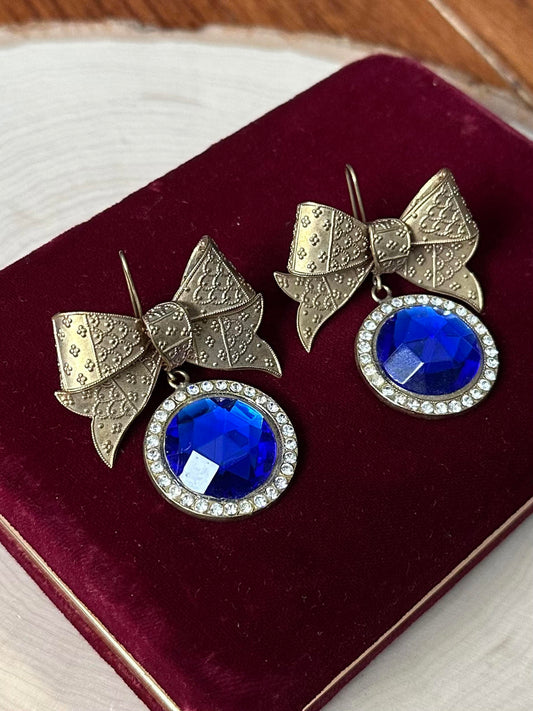 1980s Signed TONIC Gold Tone Bow Blue Rhinestone Statement Earrings
