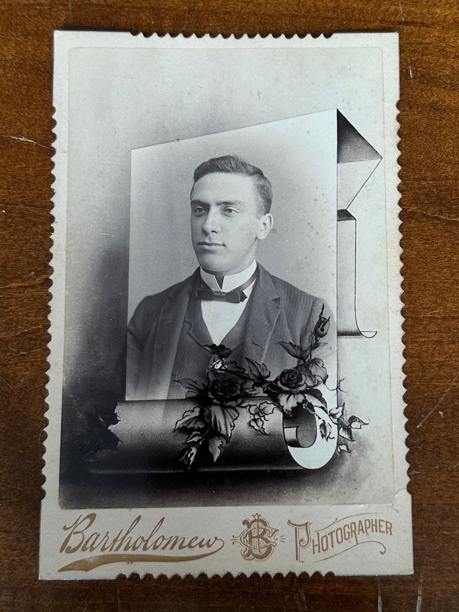 Antique Late 1800s Bartholomew Cabinet Card Portrait of Man Roses & Scroll Design Crimped Edges