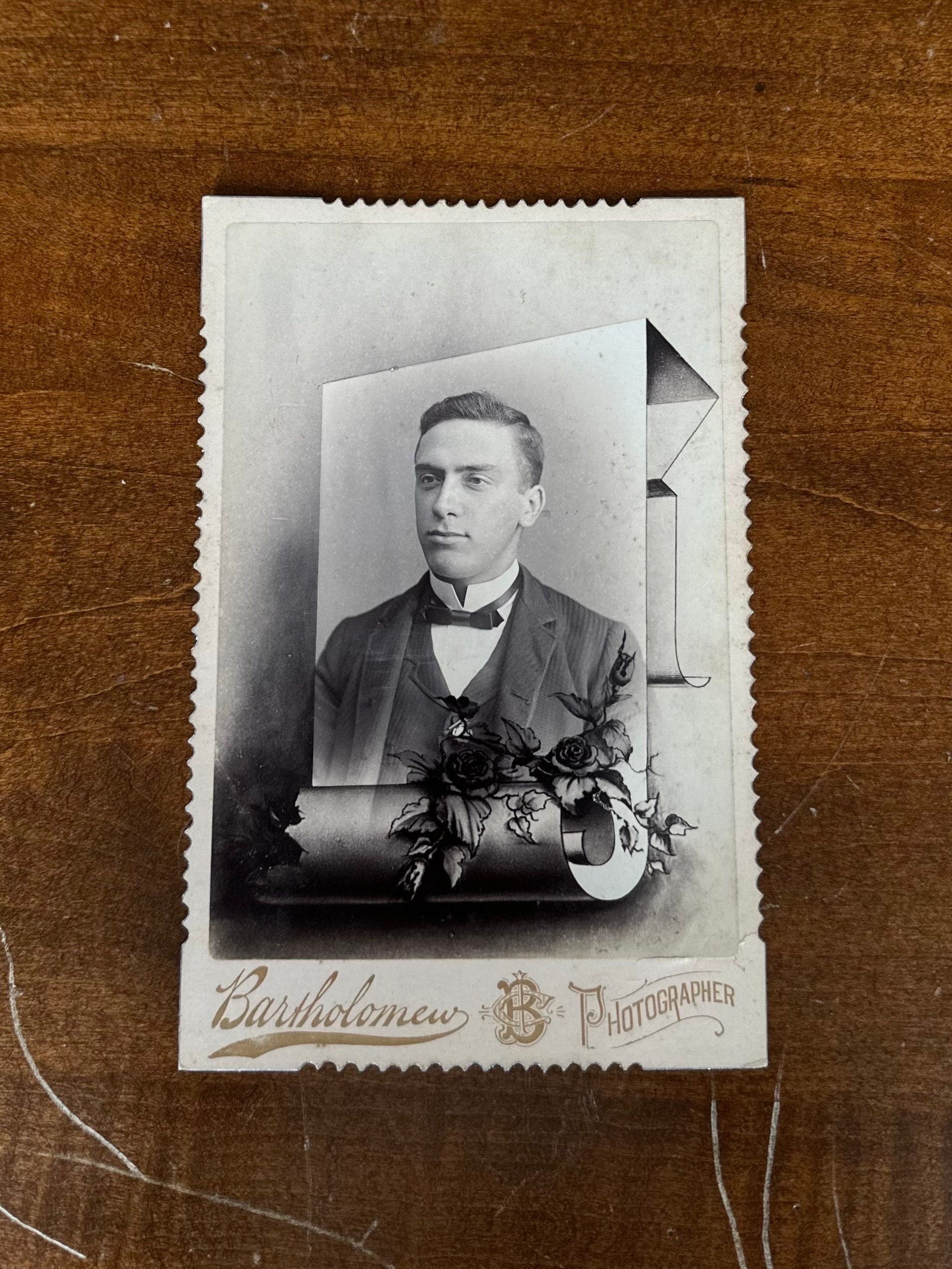 Antique Late 1800s Bartholomew Cabinet Card Portrait of Man Roses & Scroll Design Crimped Edges